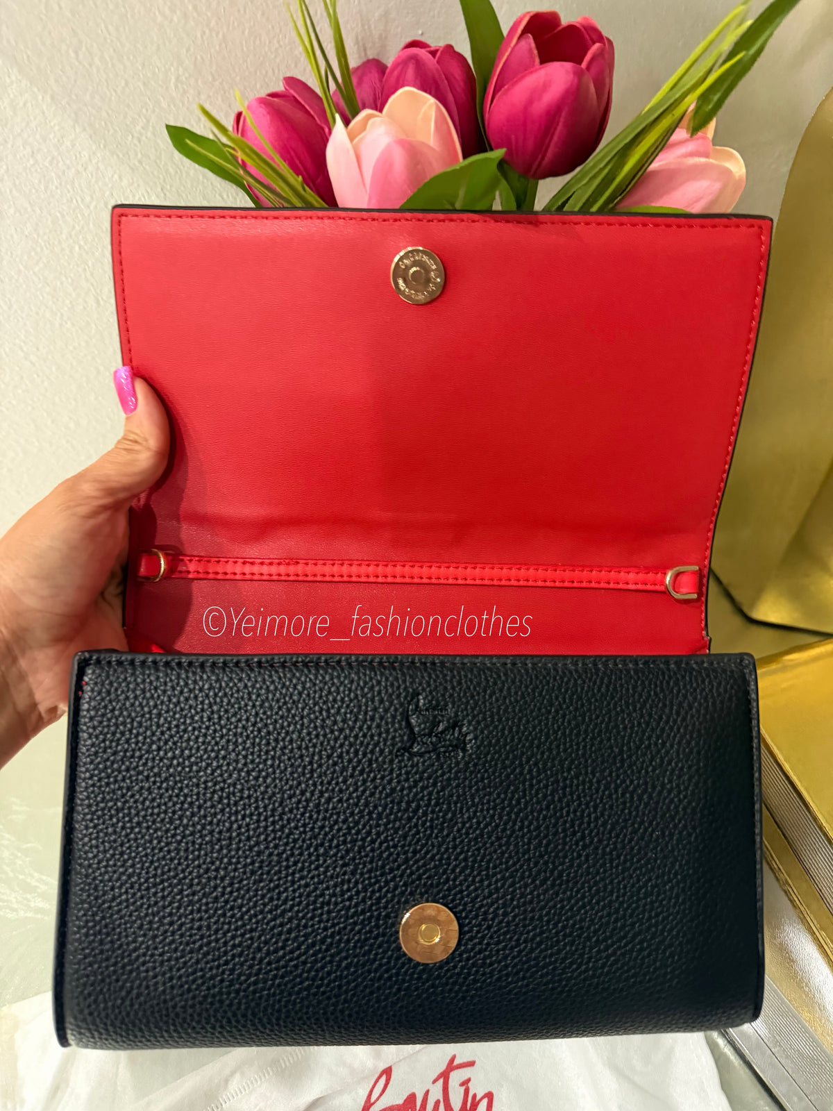 Black handbag with gold details Includes detachable gold chain strap ( Includes box)