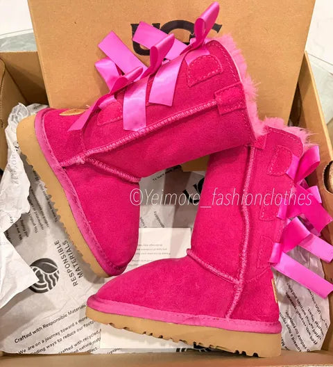 Beautiful UGG-style boots for kids featuring multiple satin bows and a soft, cozy lining. Perfect for adding a cute and stylish touch to any outfit.