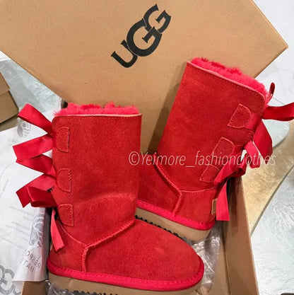 Beautiful UGG-style boots for kids featuring multiple satin bows and a soft, cozy lining. Perfect for adding a cute and stylish touch to any outfit.