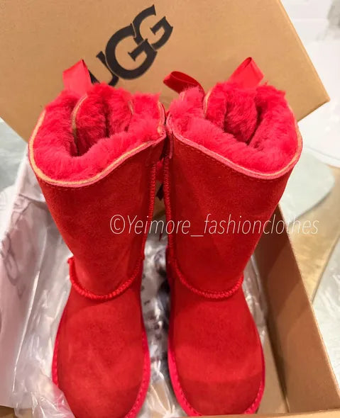Beautiful UGG-style boots for kids featuring multiple satin bows and a soft, cozy lining. Perfect for adding a cute and stylish touch to any outfit.
