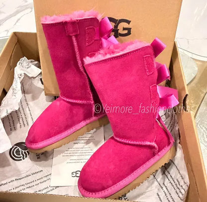 Beautiful UGG-style boots for kids featuring multiple satin bows and a soft, cozy lining. Perfect for adding a cute and stylish touch to any outfit.