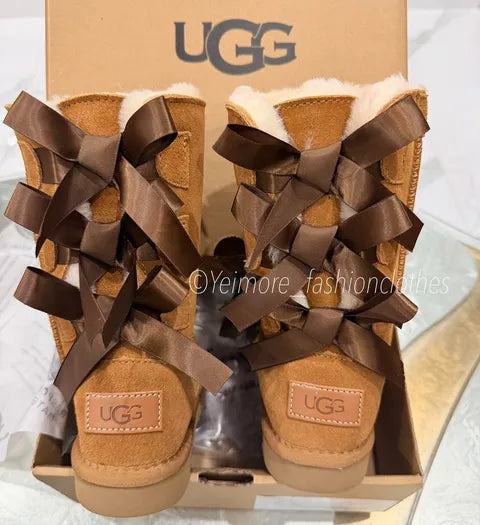 Beautiful UGG-style boots for girls, featuring multiple satin bows and a soft, cozy lining. Perfect for adding a cute and stylish touch to any outfit.