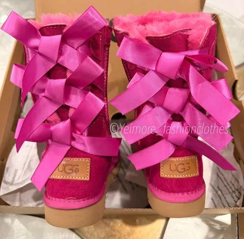 Beautiful UGG-style boots for kids featuring multiple satin bows and a soft, cozy lining. Perfect for adding a cute and stylish touch to any outfit.