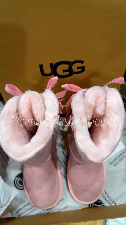 Beautiful UGG-style boots for kids featuring multiple satin bows and a soft, cozy lining. Perfect for adding a cute and stylish touch to any outfit.
