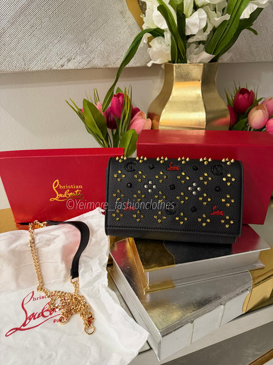 Black handbag with gold details Includes detachable gold chain strap ( Includes box)